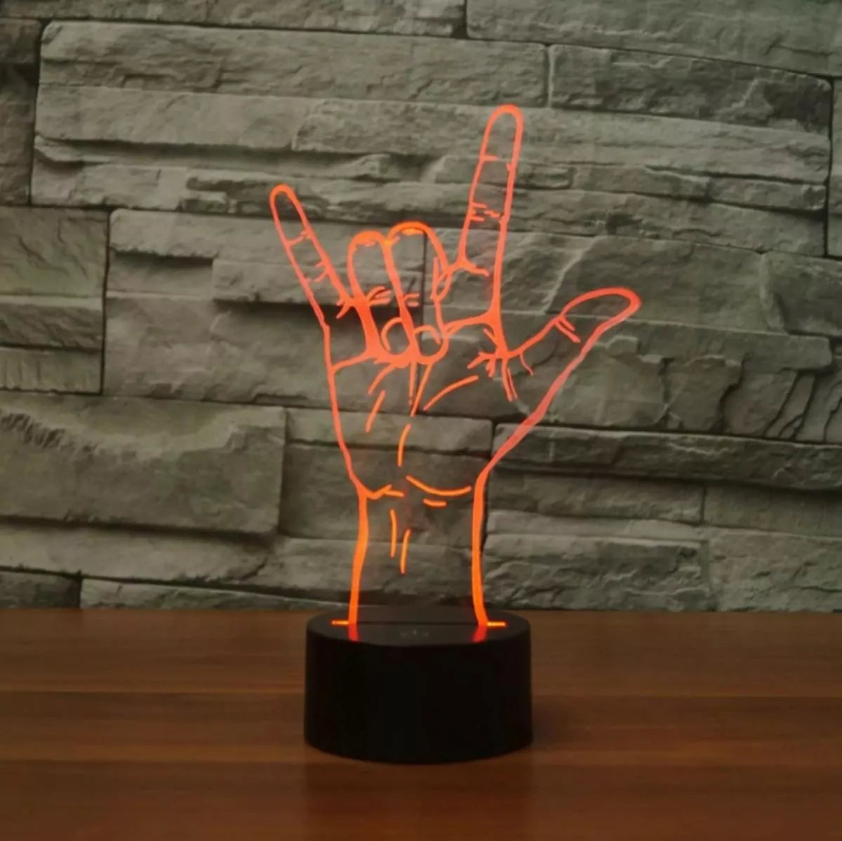 LED lampa ve tvaru ruky
