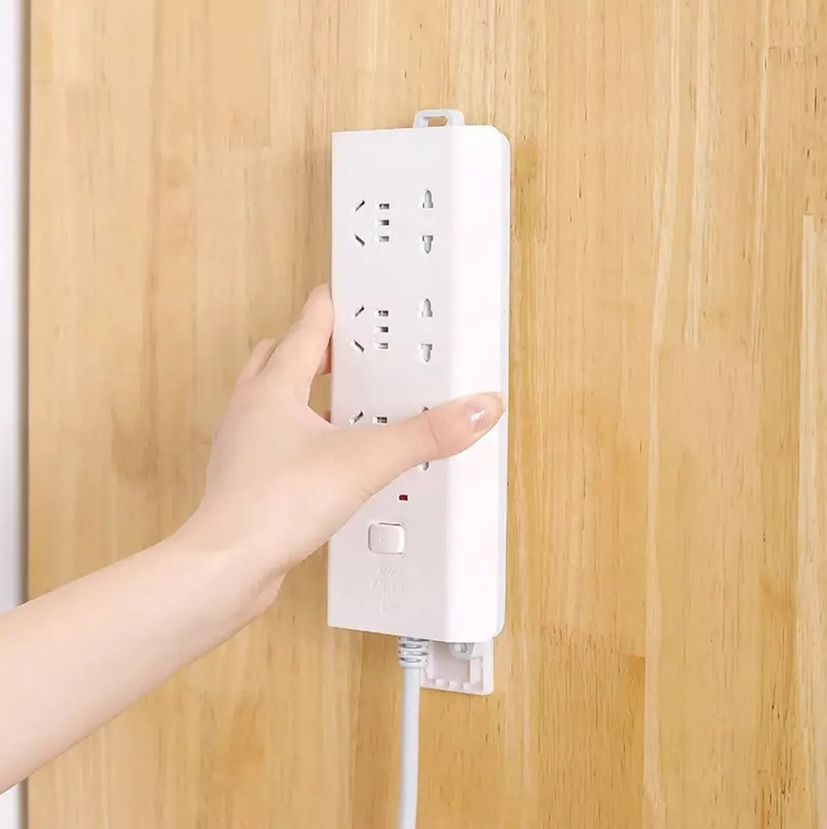 Nástěnný držák pro elektrickou pásku